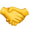 Zwei gelbe Hände die sich die Hand geben